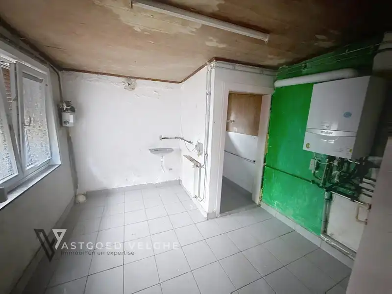 Te renoveren halfopen bebouwing met garage te koop in Maasmechelen (Boudewijnlaan) foto 10
