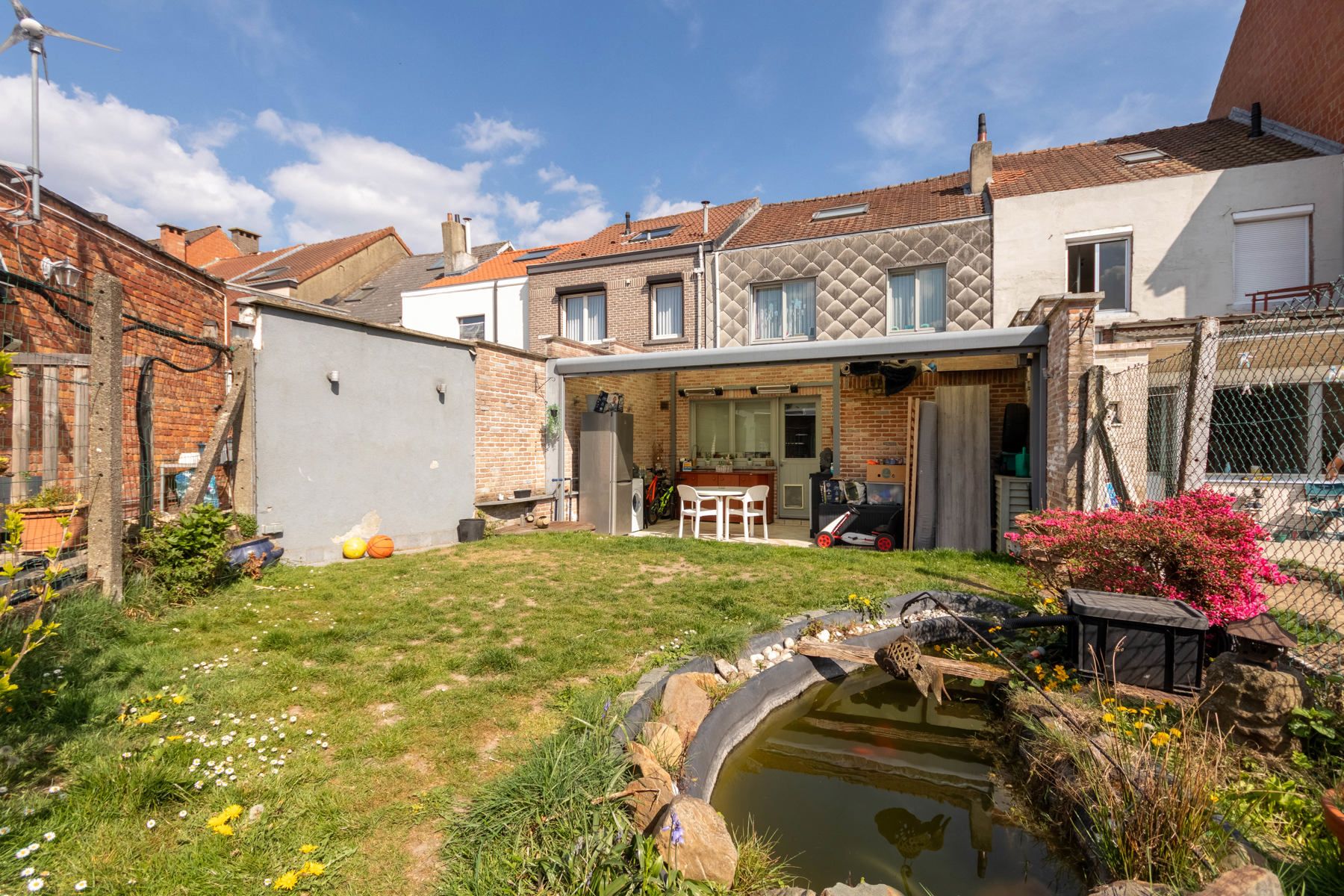 Goed onderhouden woning met 4 slaapkamers en leuke tuin foto 20