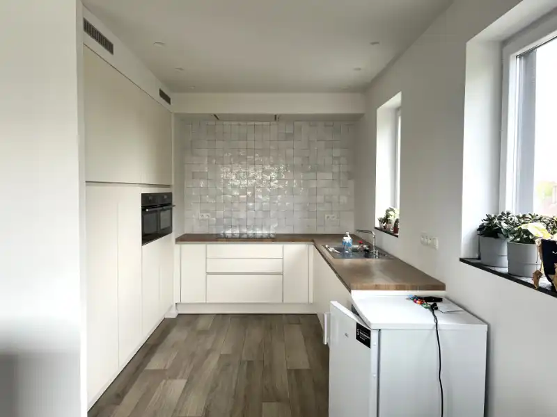 Ruim en lichtrijk appartement met garage op rustige, centrale ligging foto 2