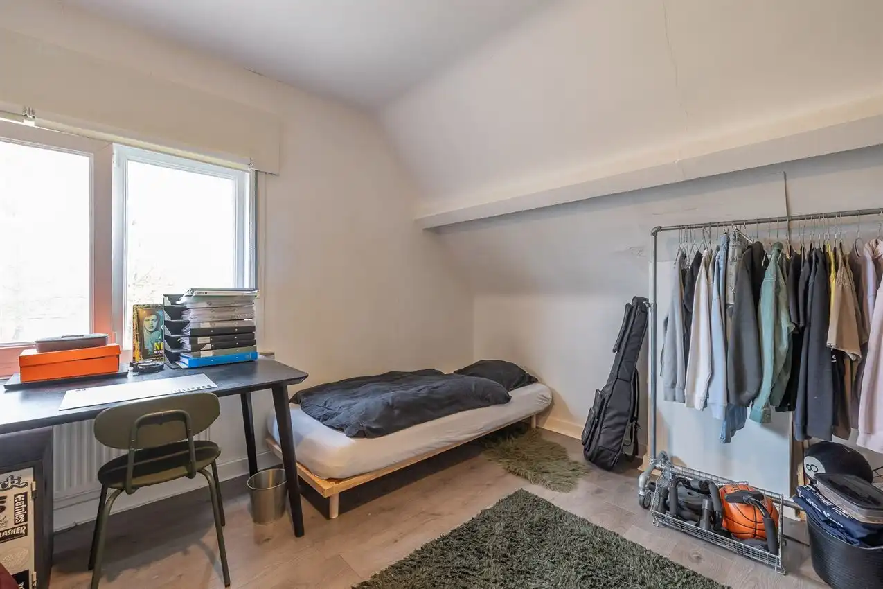 Centraal gelegen woning met garage, 3 slpk. en tuin foto 17