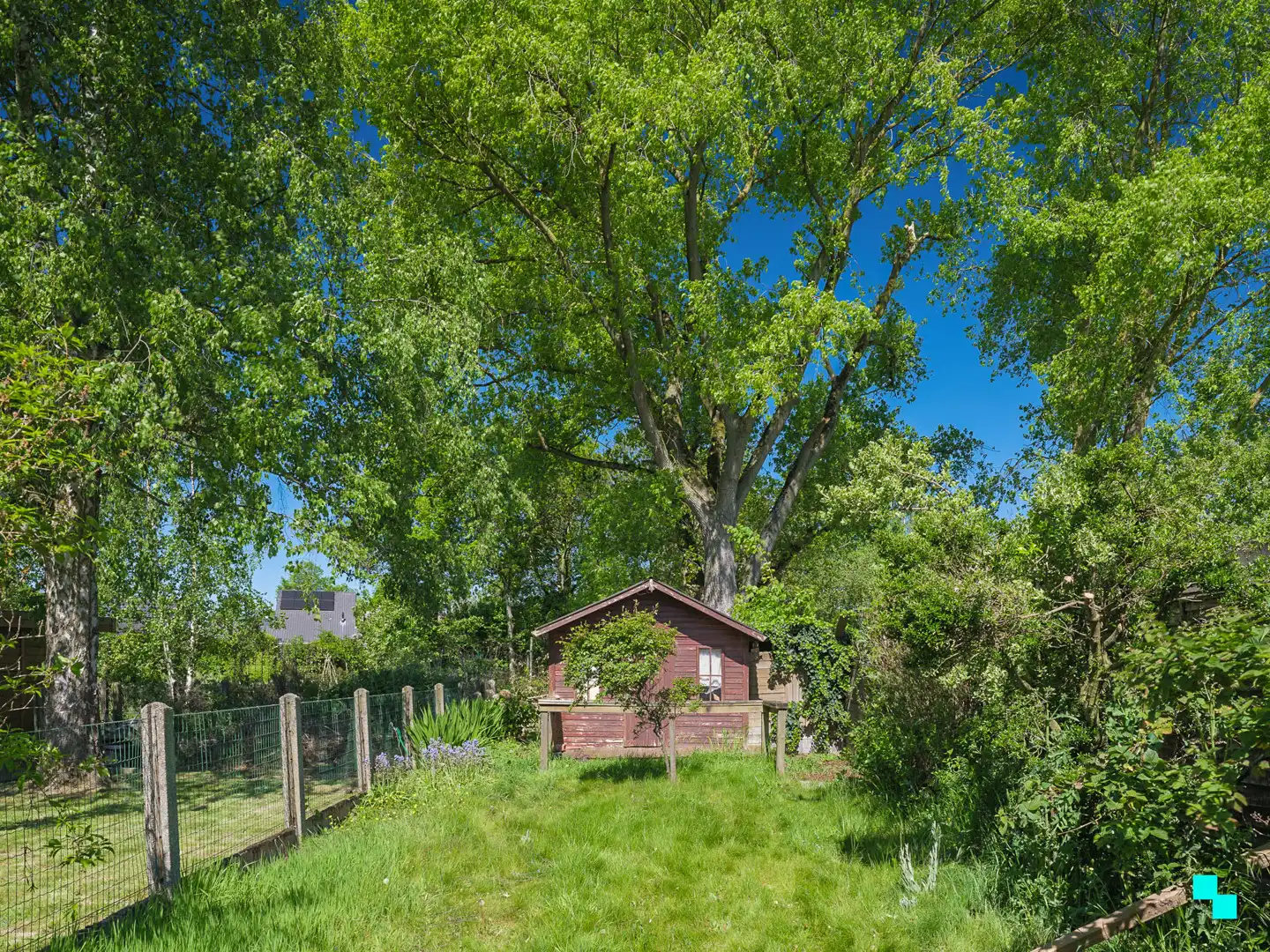 Te renoveren woning met gezellige tuin in het hart van Merelbeke foto 25