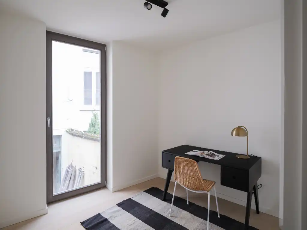 Luxueus appartement met groot volume en terras op toplocatie aan de Sint-Michielskerk foto 13