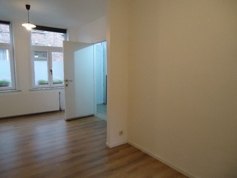 Goed gelegen gelijkvloers appartement foto 4