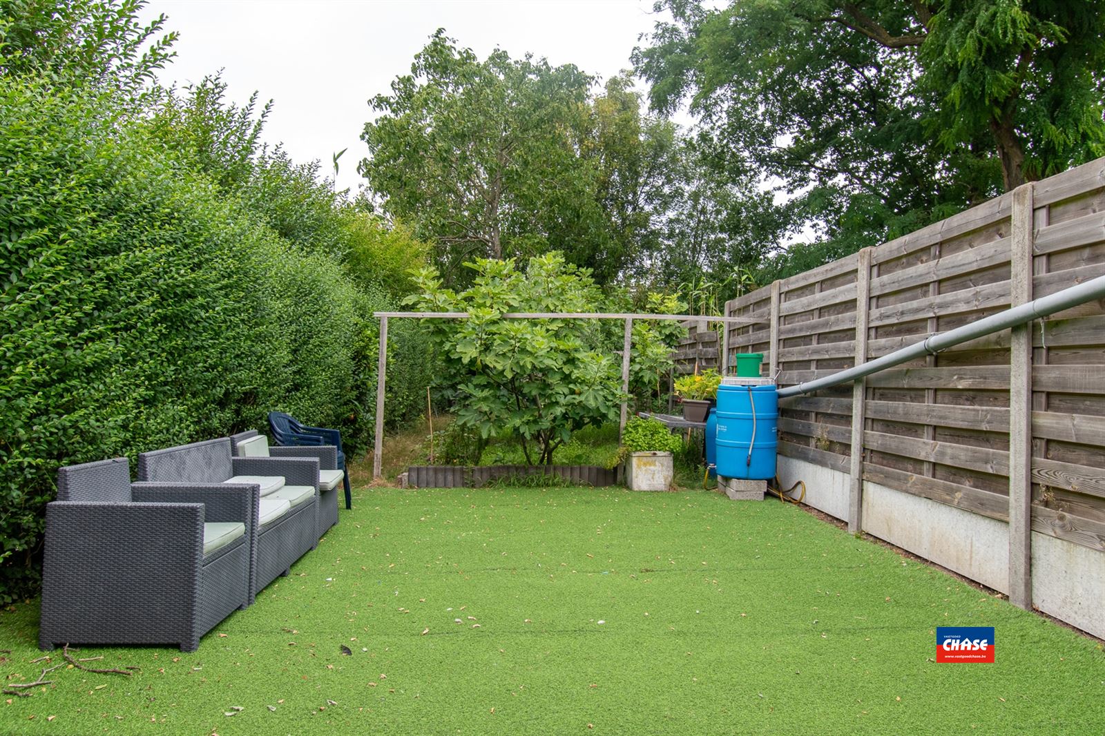 Gerenoveerde rijwoning met 4/5 slaapkamers en grote tuin foto 3