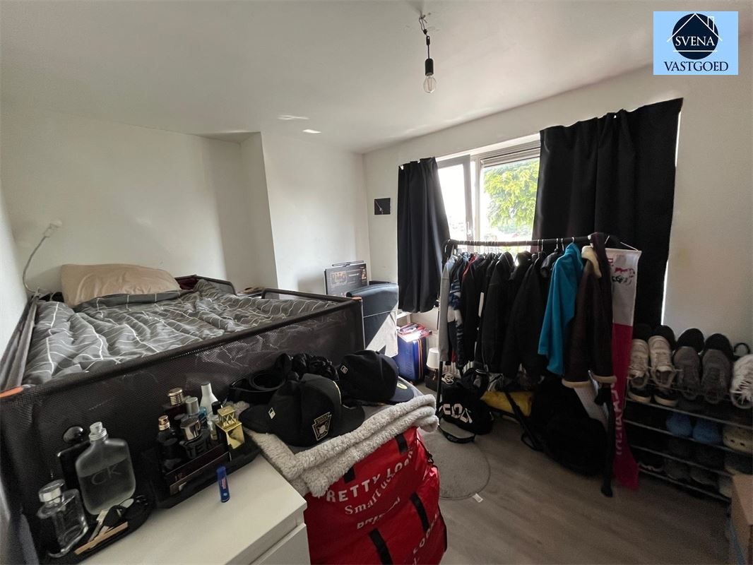 OPBRENGSTEIGENDOM BESTAANDE UIT 1 HANDELSZAAK EN 3 APPARTEMENTEN foto 18