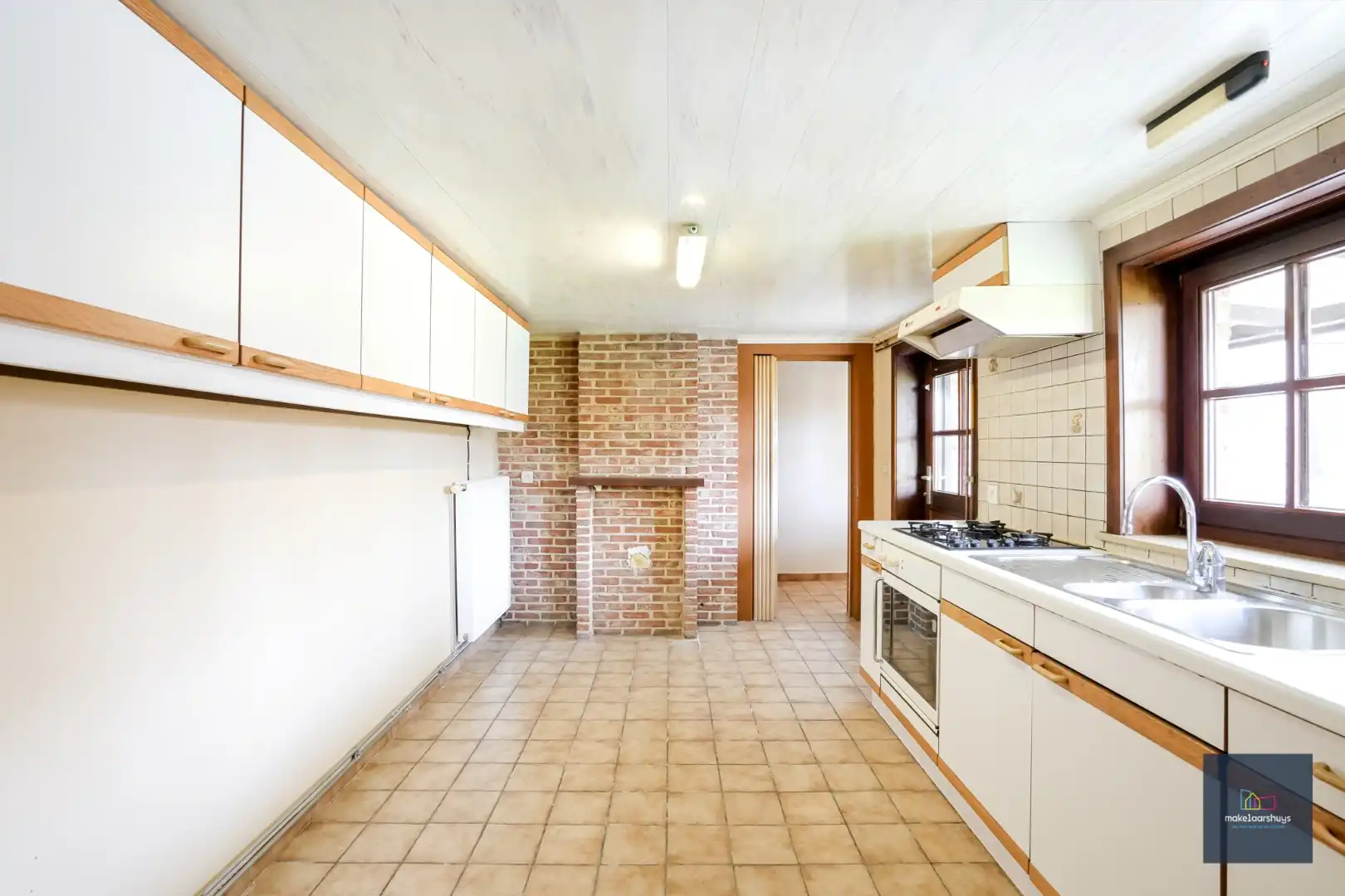 Ruime  halfopen bebouwing  met  zonnige tuin, terras en garage in Waarschoot  foto 11