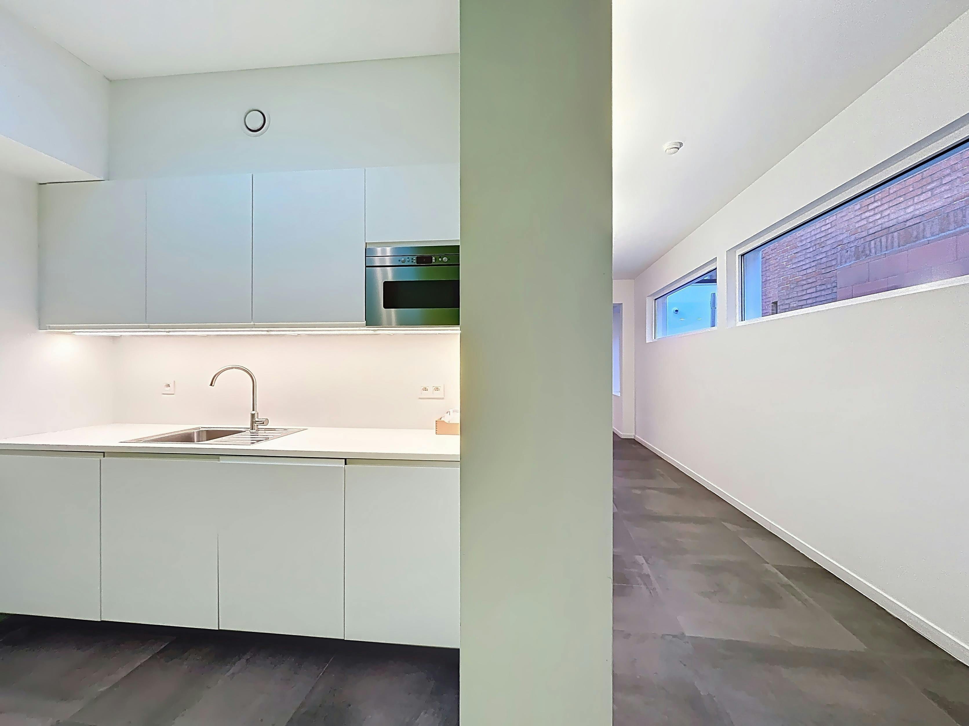 Instapklaar handelspand met woonst te koop op de Boelare in Eeklo foto 30