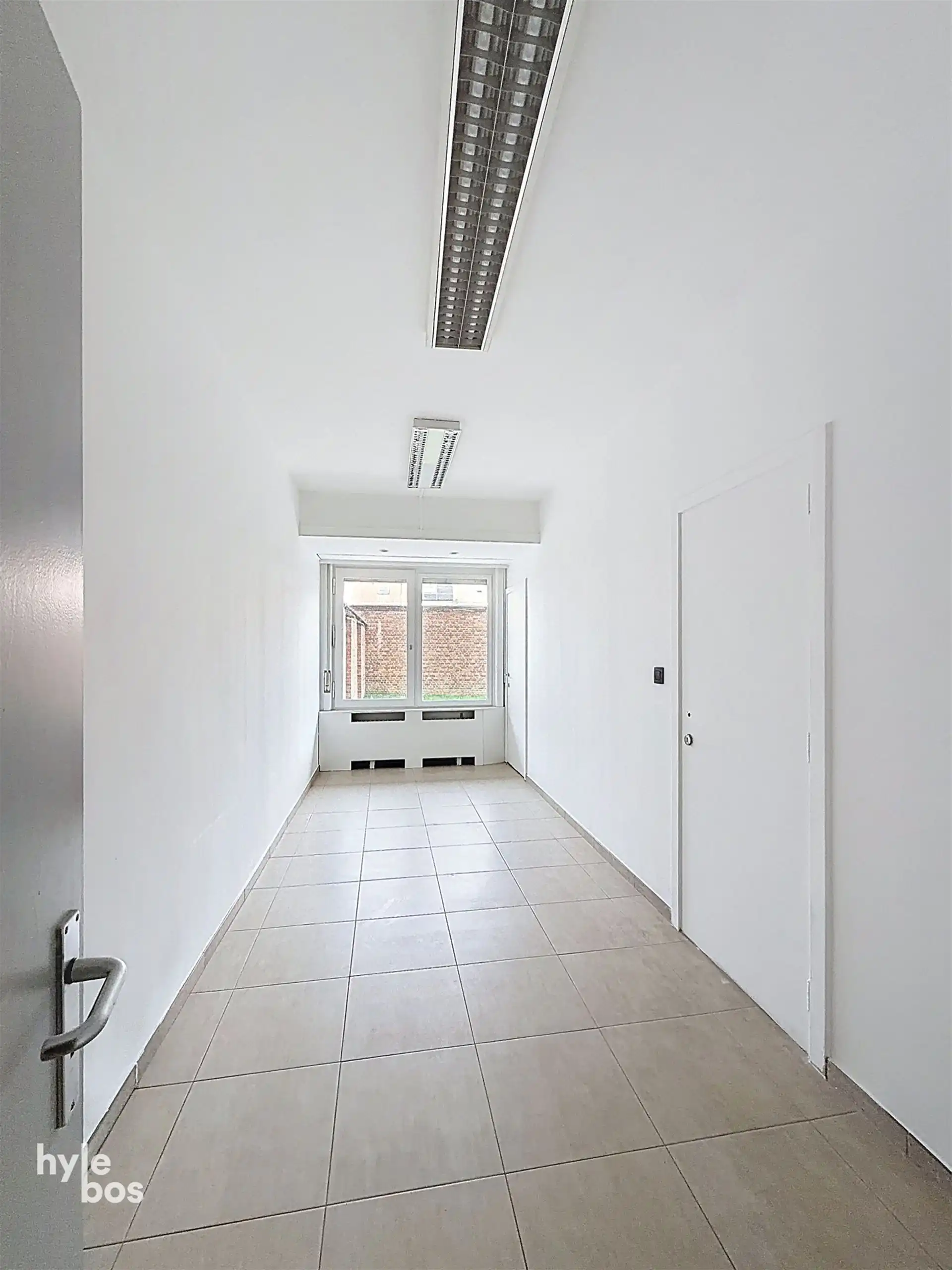 Uitzonderlijk groot gelijkvloers appartement met stadstuin en garage foto 7