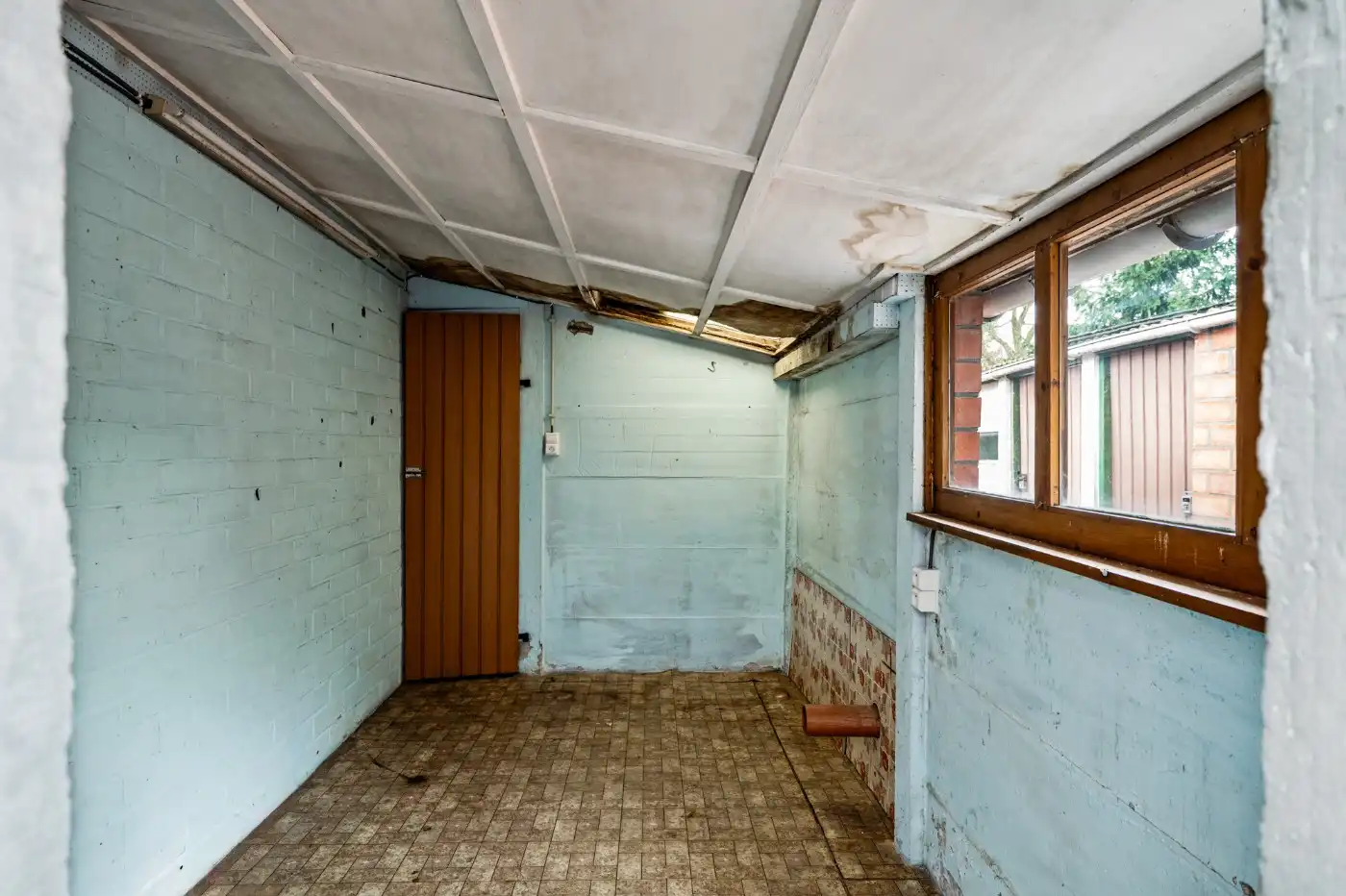 Te renoveren woning met 2 slpk. en tuin foto 12