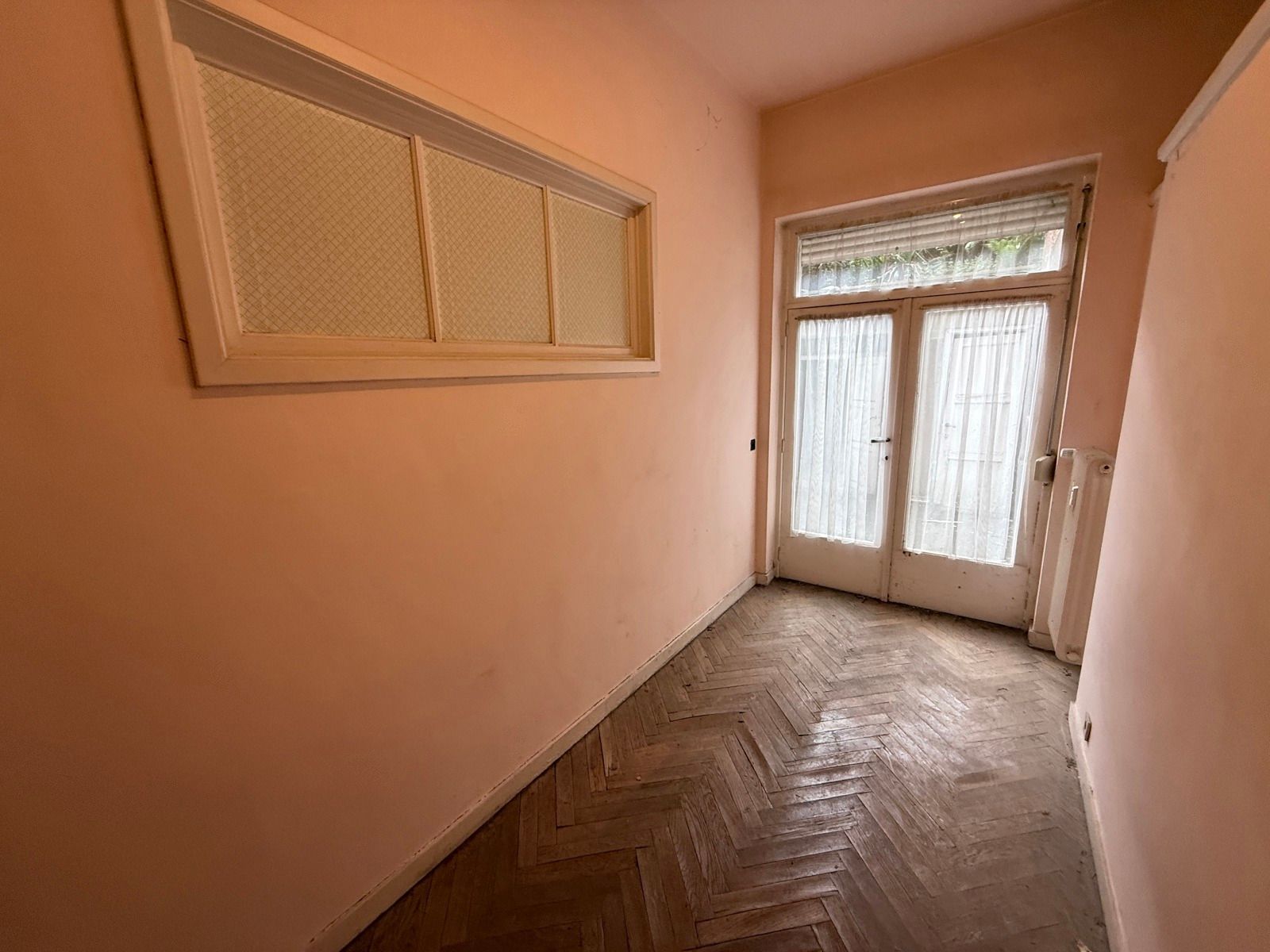 Te renoveren gelijkvloers appartement met 2 slaapkamers foto 8