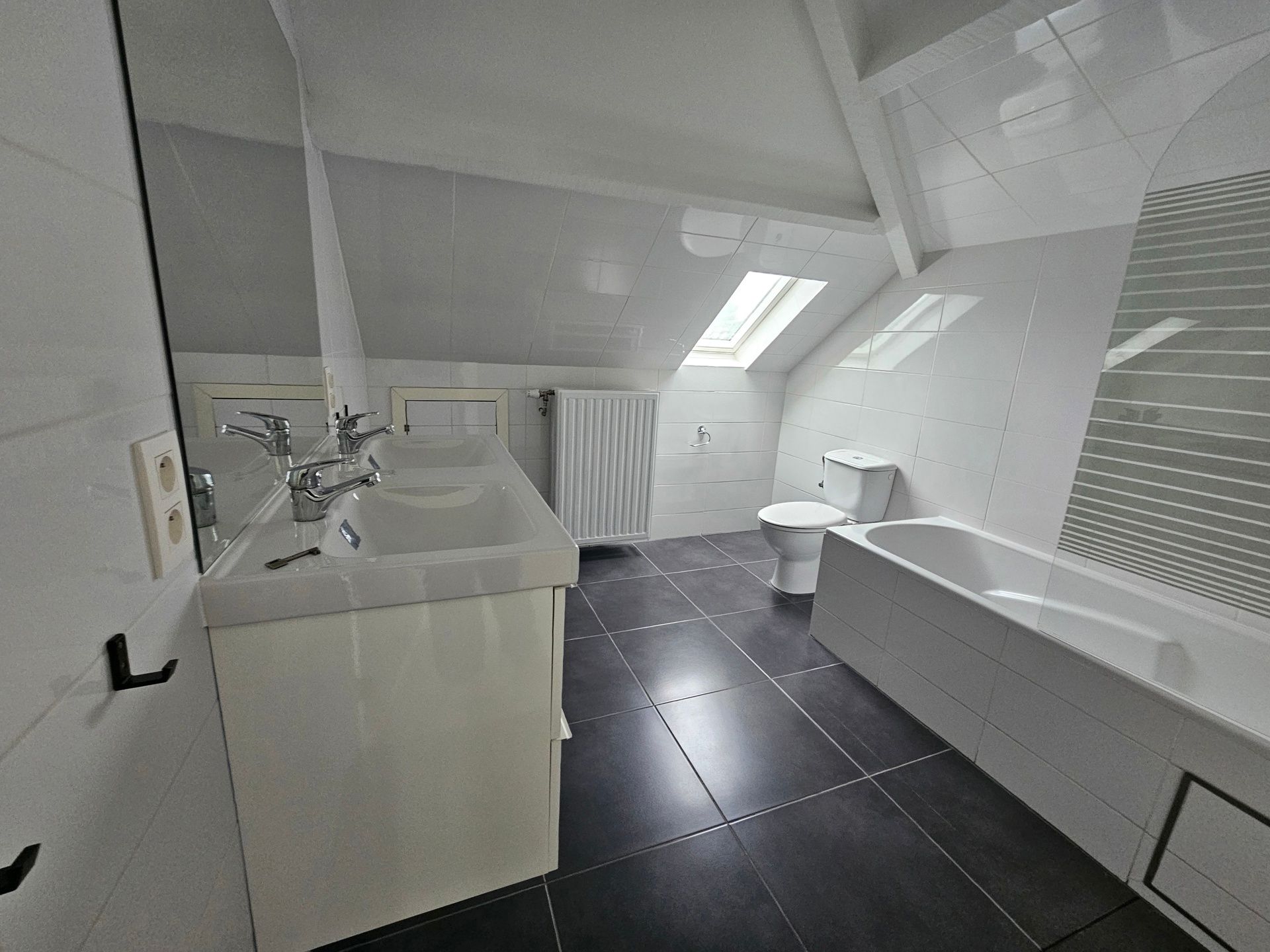 Lichtrijk duplexappartement met groot terras in centrum foto 8