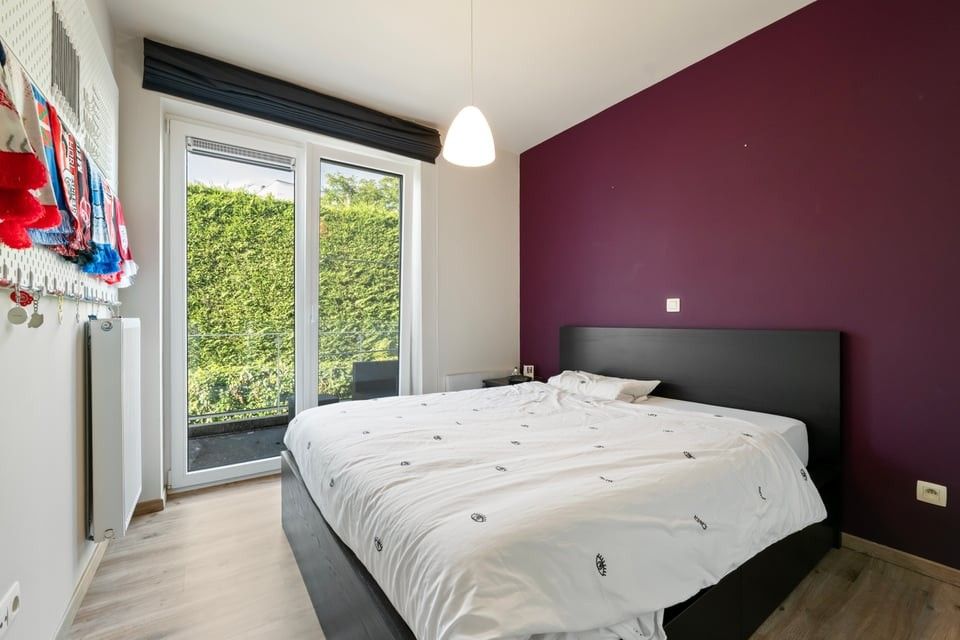 KNAP APPARTEMENT MET 1 SLAAPKAMER EN STAANPLAATS IN SINT-TRUIDEN foto 11