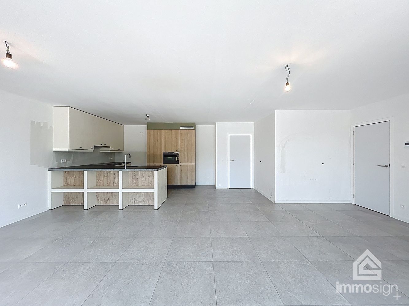 Instapklaar nieuwbouwappartement met 2 slaapkamers, terras en autostaanplaats te Kinrooi foto 3