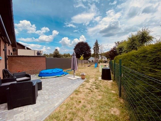 Gezellige halfopen woning met grote tuin foto 14