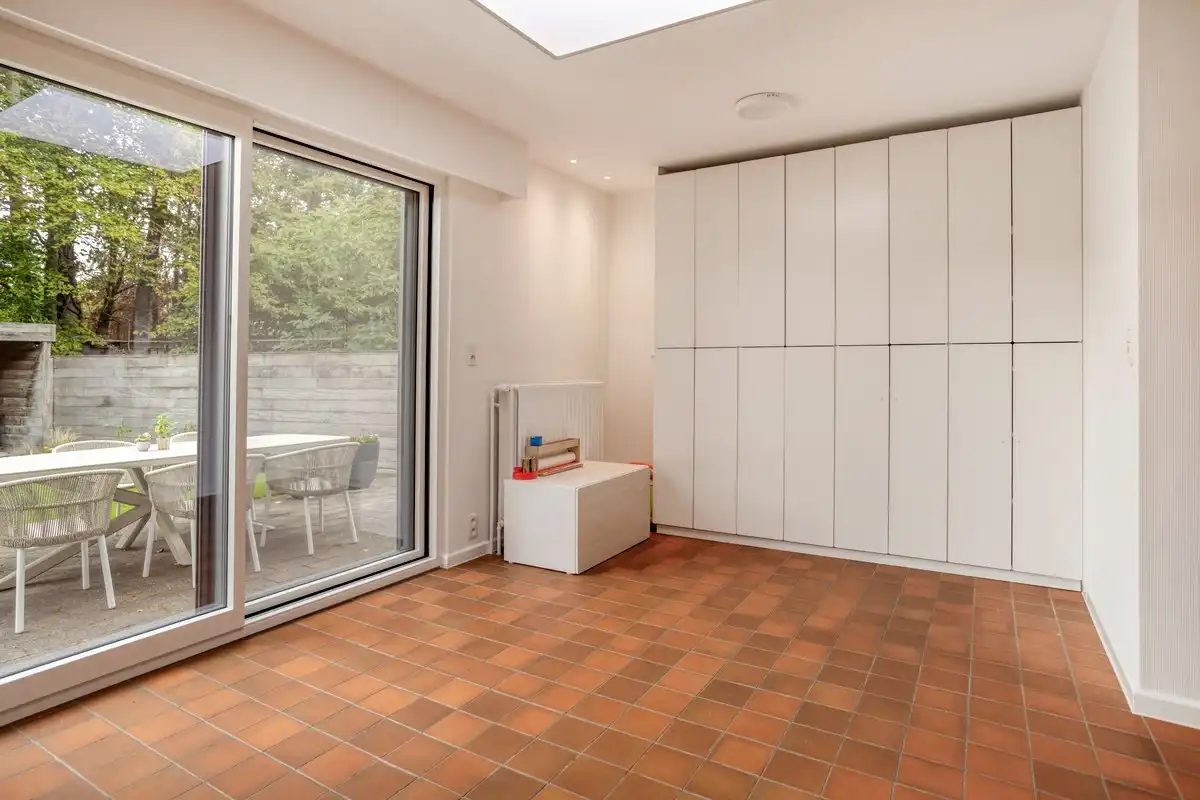 Charmante energiezuinige halfopen bebouwing met 4 slaapkamers, bureau en tuin in centrum Brasschaat foto 8