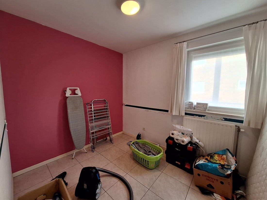 Stijlvol gelijkvloers appartement met terras en autostandplaats foto 10
