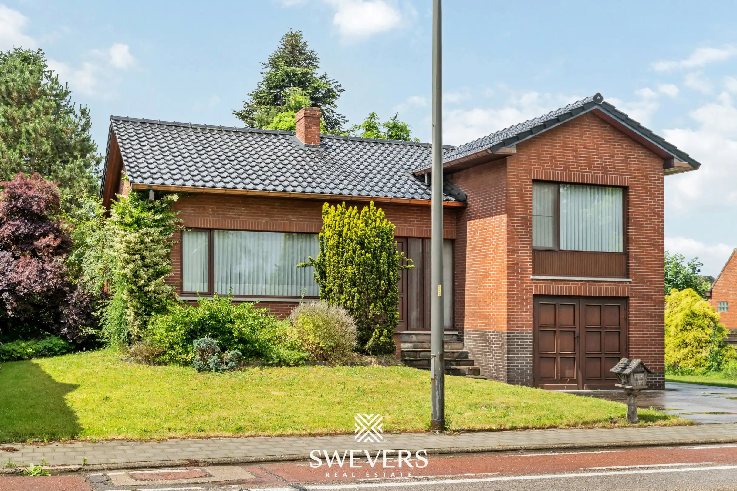 Woning met potentieel op groen perceel te Heppen foto 2
