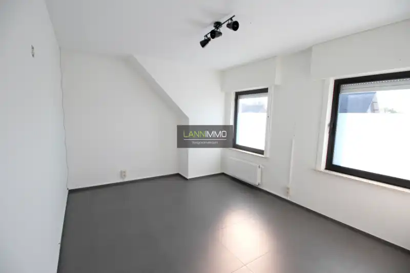 Gerenoveerde woonst met 2 slaapkamers en tuin foto 16