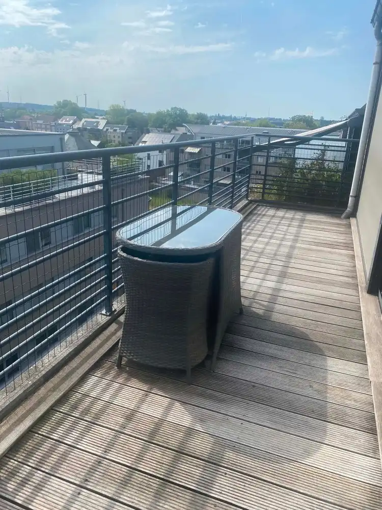 Ruim en centraal gelegen appartement met groot terras en 2 autostaanplaatsen foto 6