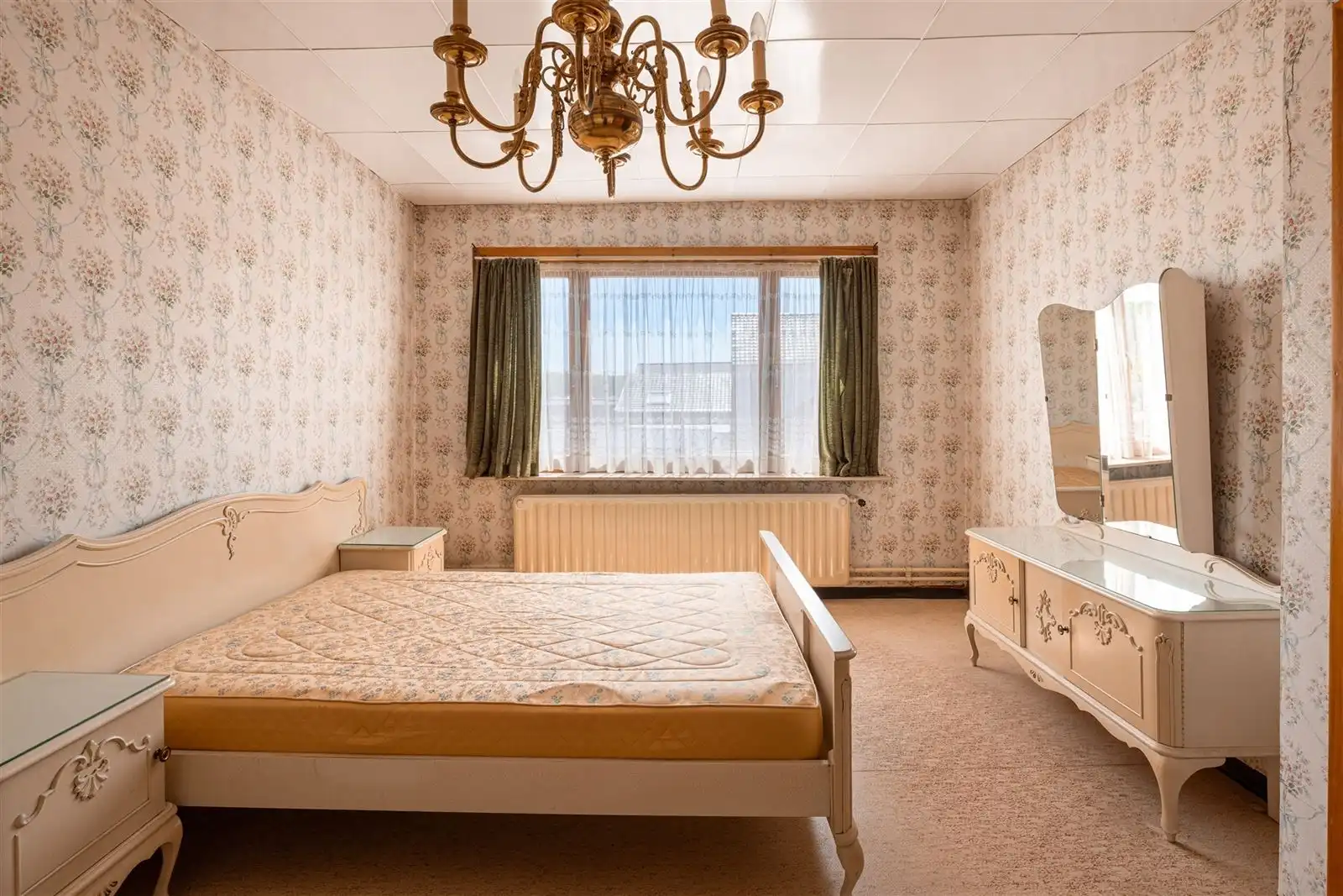 Te renoveren woning mét garage foto 9