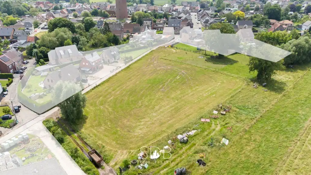 Bouwgrond met gezinstuin en aanpalend grasland op 7.598m² foto 3