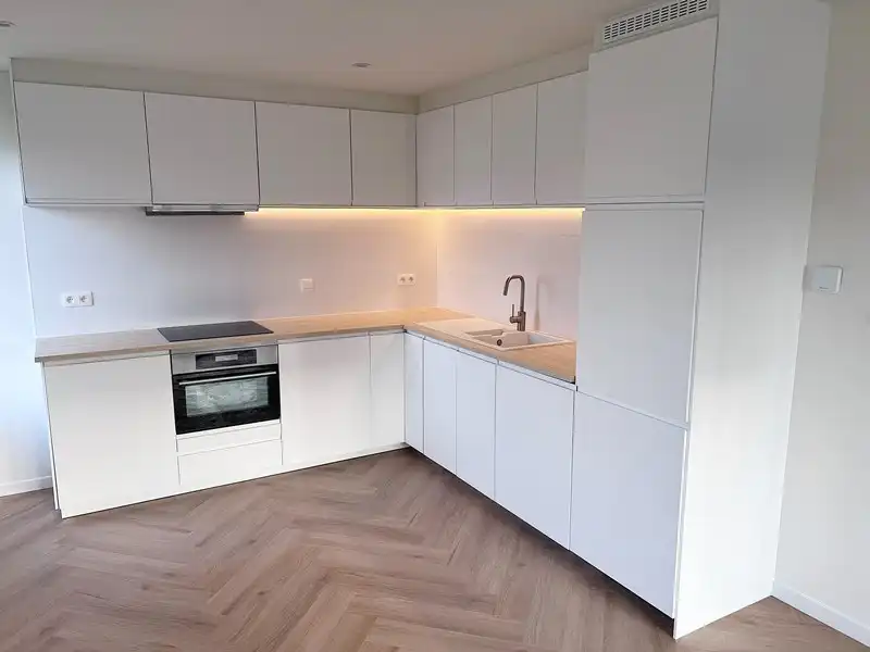 Stijlvol gerenoveerd appartement met 3 slaapkamers, garage en berging foto 7