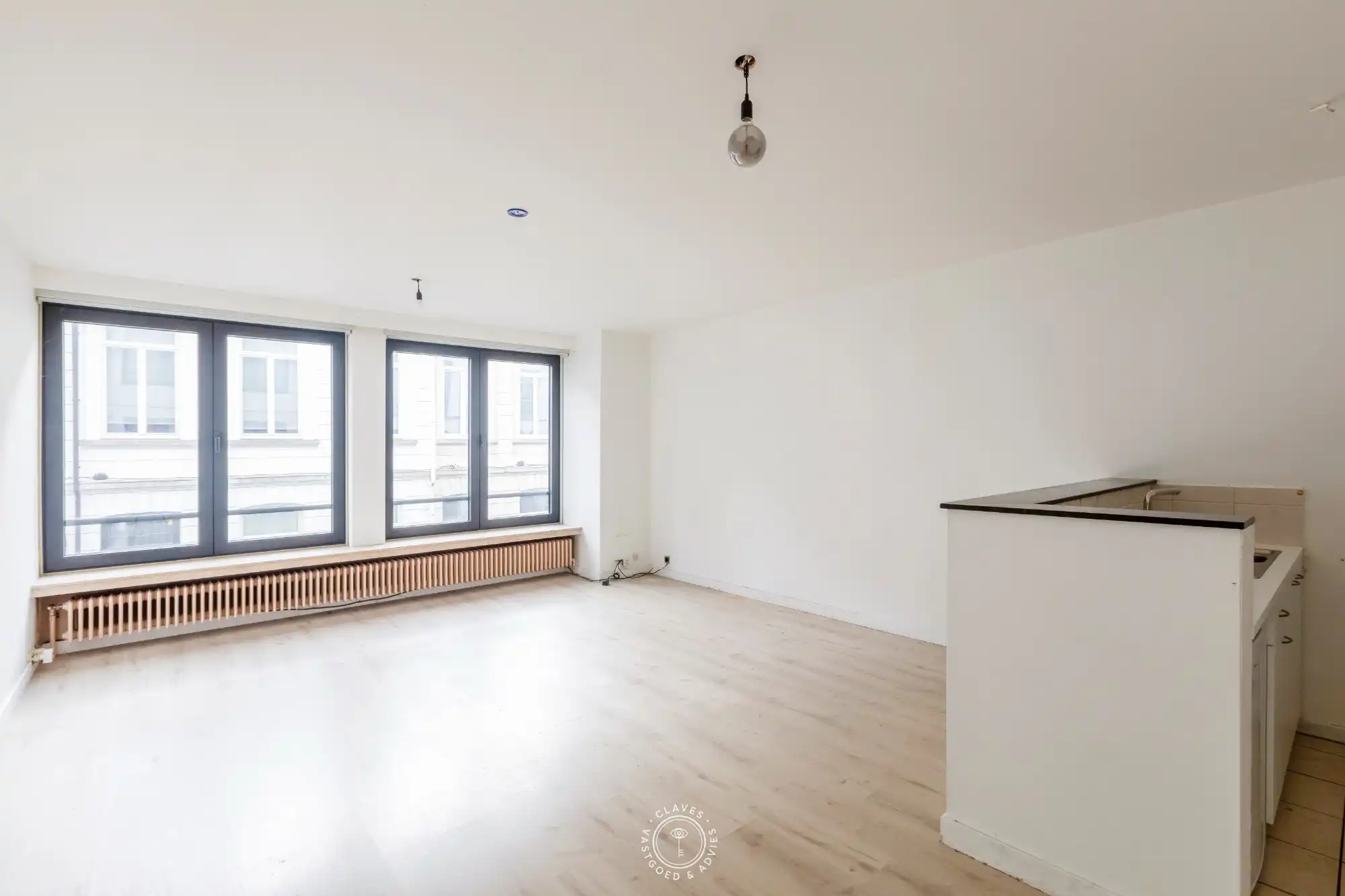 Eén-slaapkamerappartement in hartje Sint-Niklaas foto {{pictureIndex}}