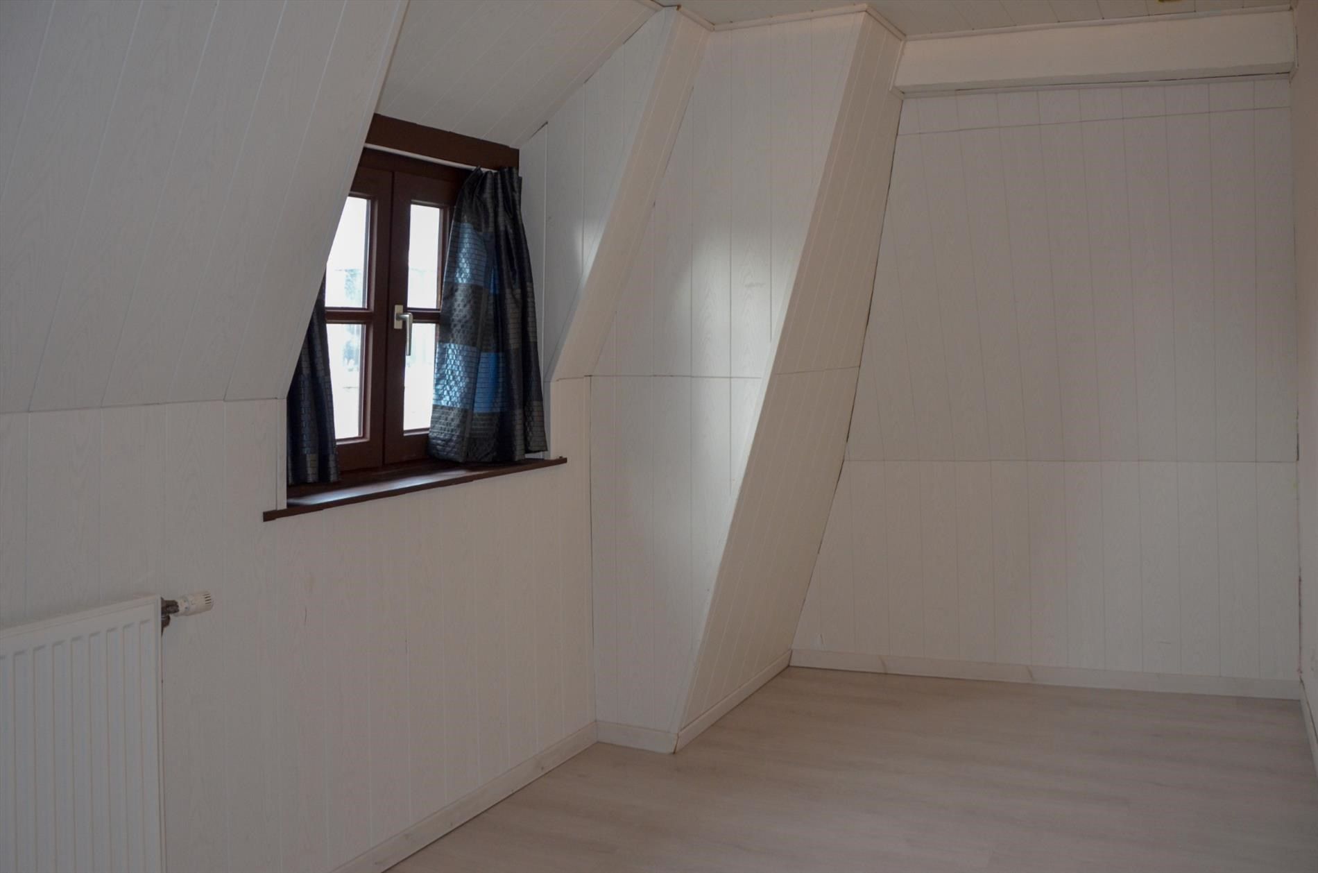 Hoekwoning met 2 slaapkamers en koertje. foto 11