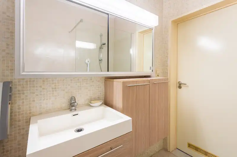 Gelijkvloers 2 slpk. appartement met tuin en garage foto 10