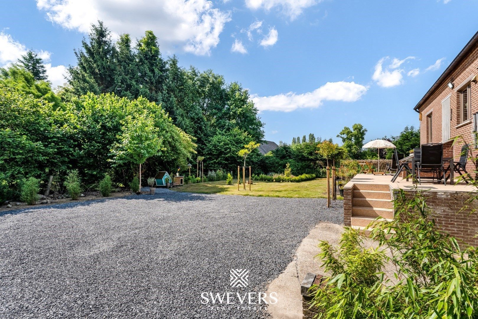 Ruime gezinswoning met zonnepanelen, kelder en zonnige tuin op topligging foto 26