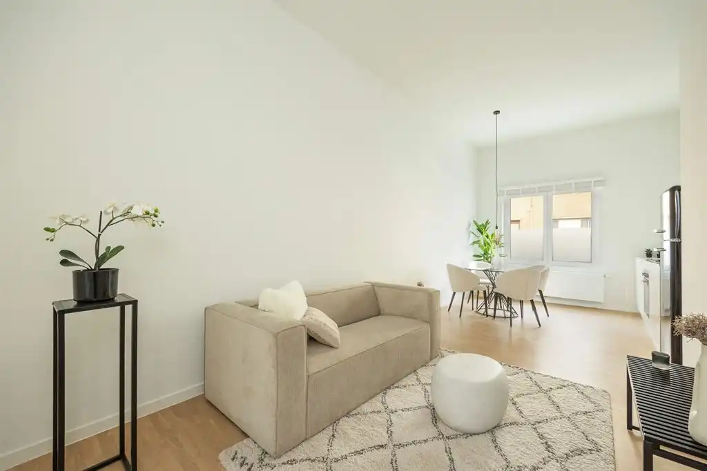 Hoofdfoto van de publicatie: Gerenoveerd gelijkvloers appartement met stadstuin