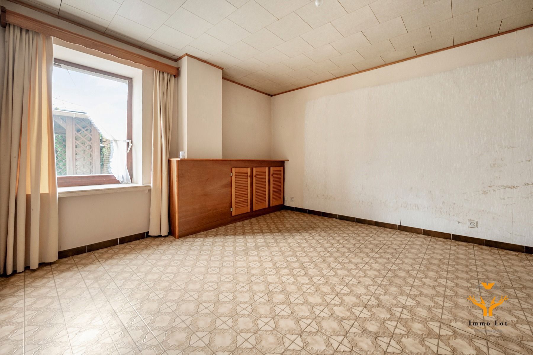 Te renoveren woning met tuin in rustige buurt foto 7