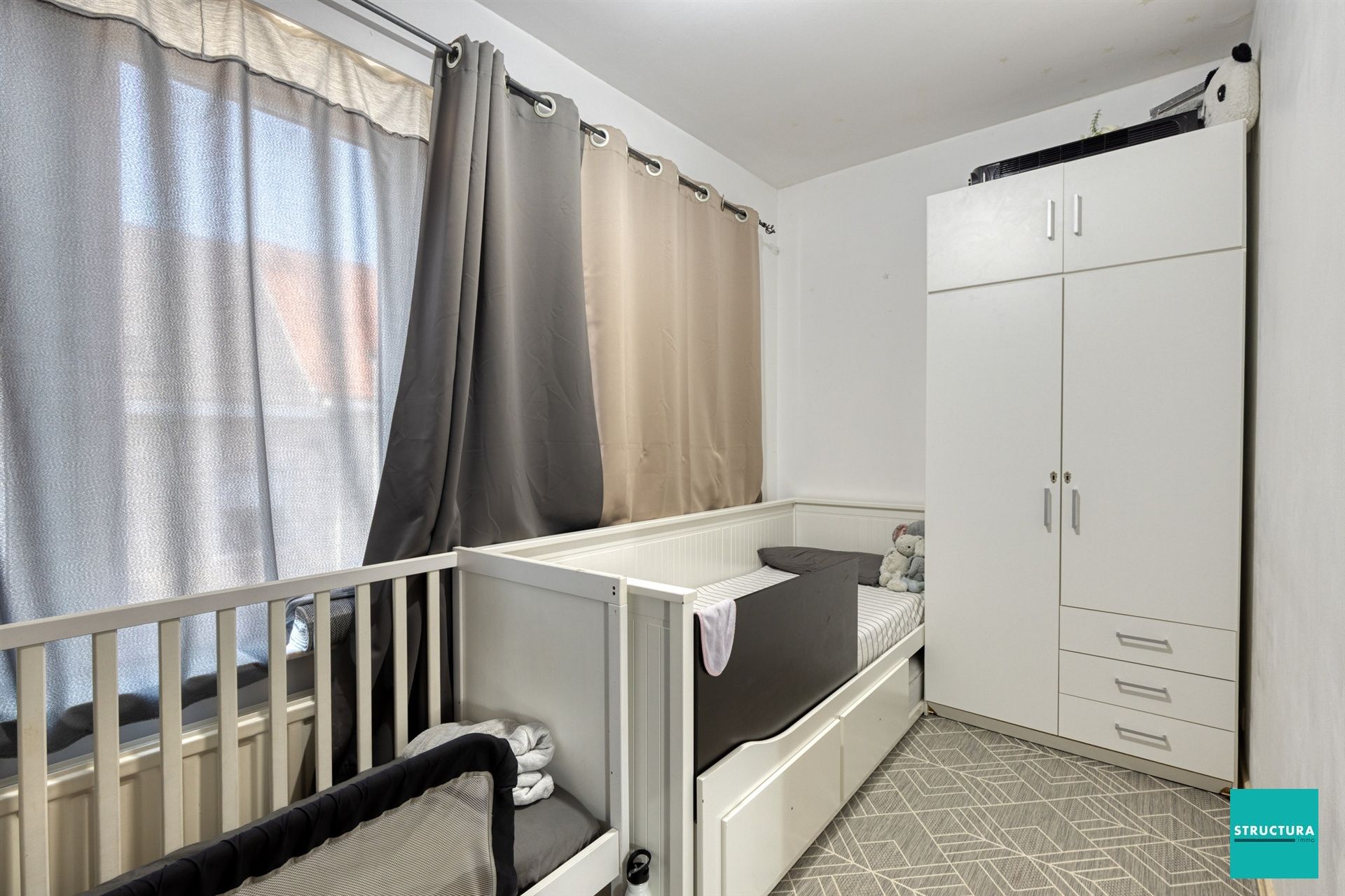 Opbrengsteigendom met 2 appartementen + 6 autostallingen foto 11