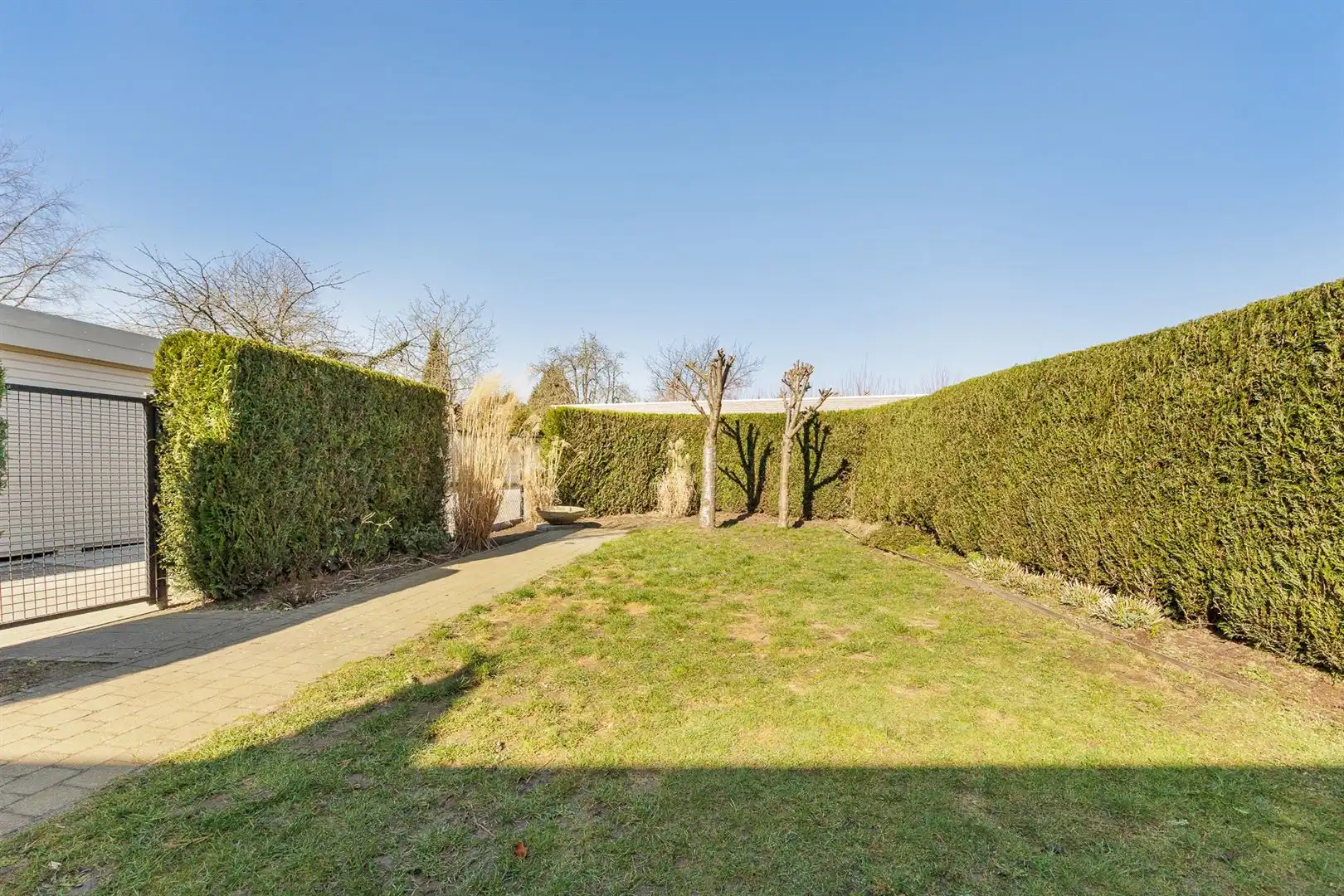 Gelijkvloers appartement met 2 slaapkamers en garage! foto 23