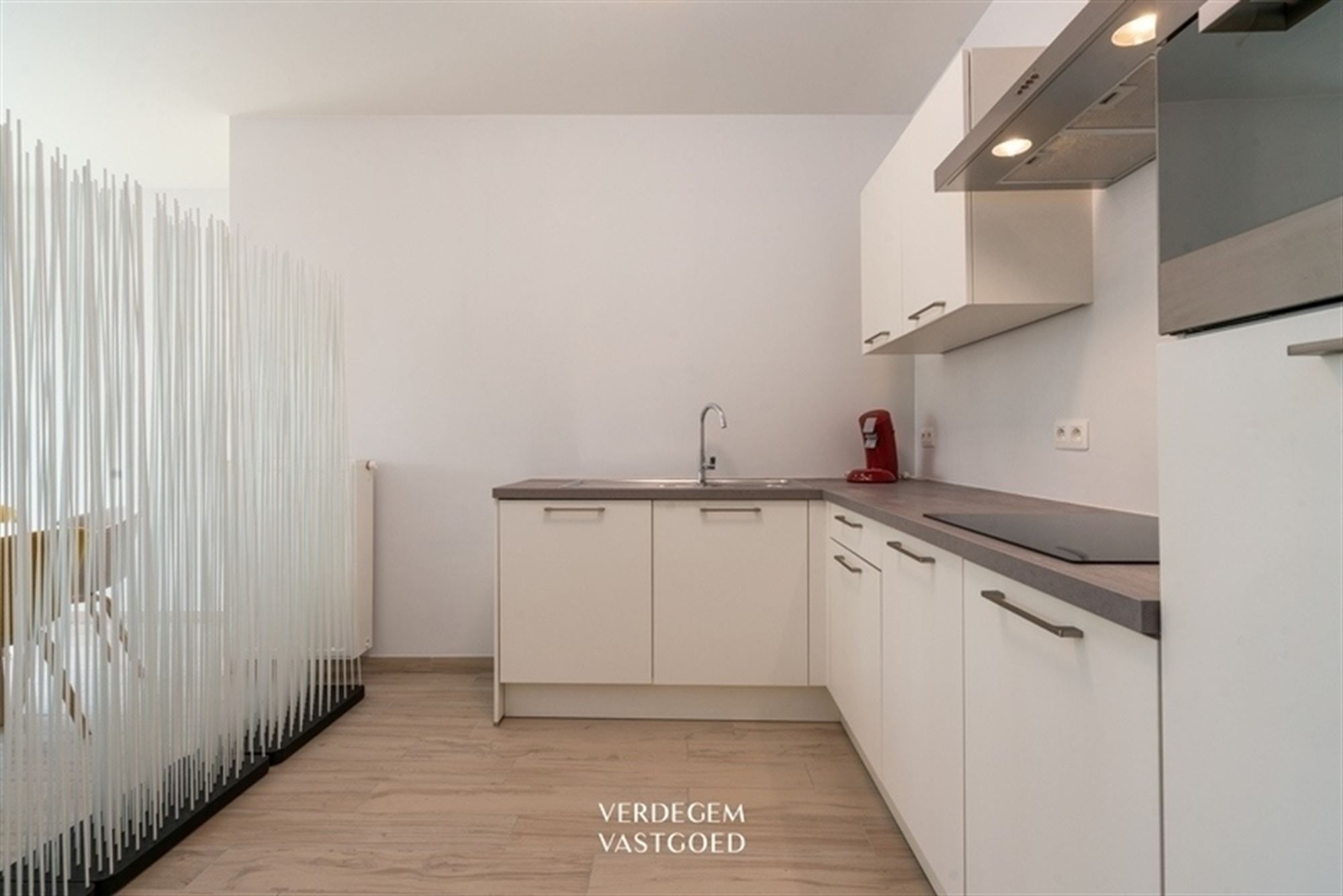 Instapklaar gelijkvloers appartement met ondergrondse autostaanplaats in rustige omgeving foto 20