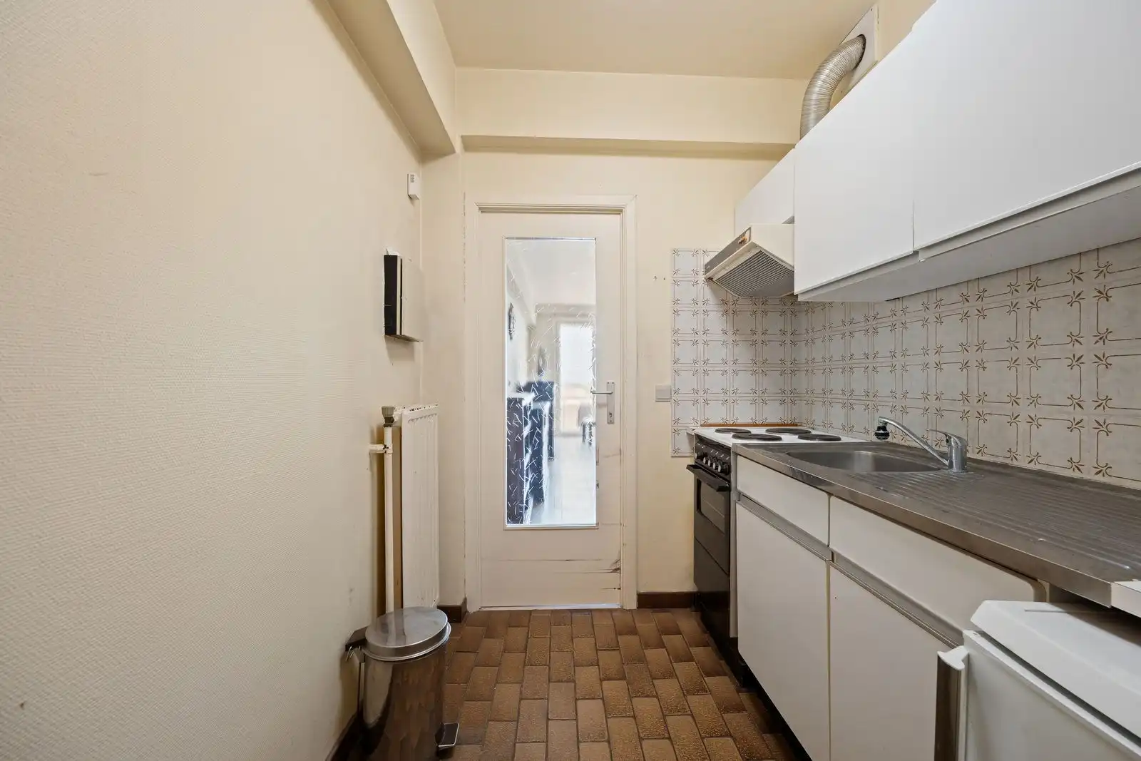 Te renoveren 1-slaapkamerappartement op de zeedijk van Zeebrugge foto 9