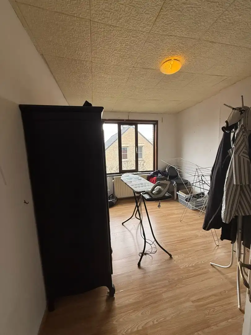 Opbrengsteigendom bestaande uit 2 halfopen woningen met garage en tuin te Hechtel. foto 15