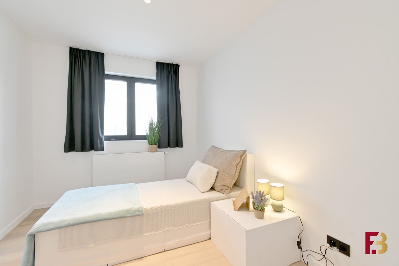 Gelijkvloersappartement met tuin en twee garages in hartje Zwijnaarde foto 13