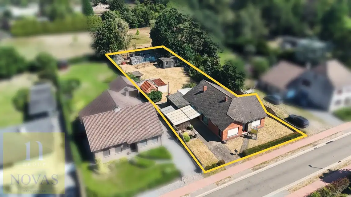 Hoofdfoto van de publicatie: Landelijk gelegen woning op een perceel van 15 are, 23m straatbreedte