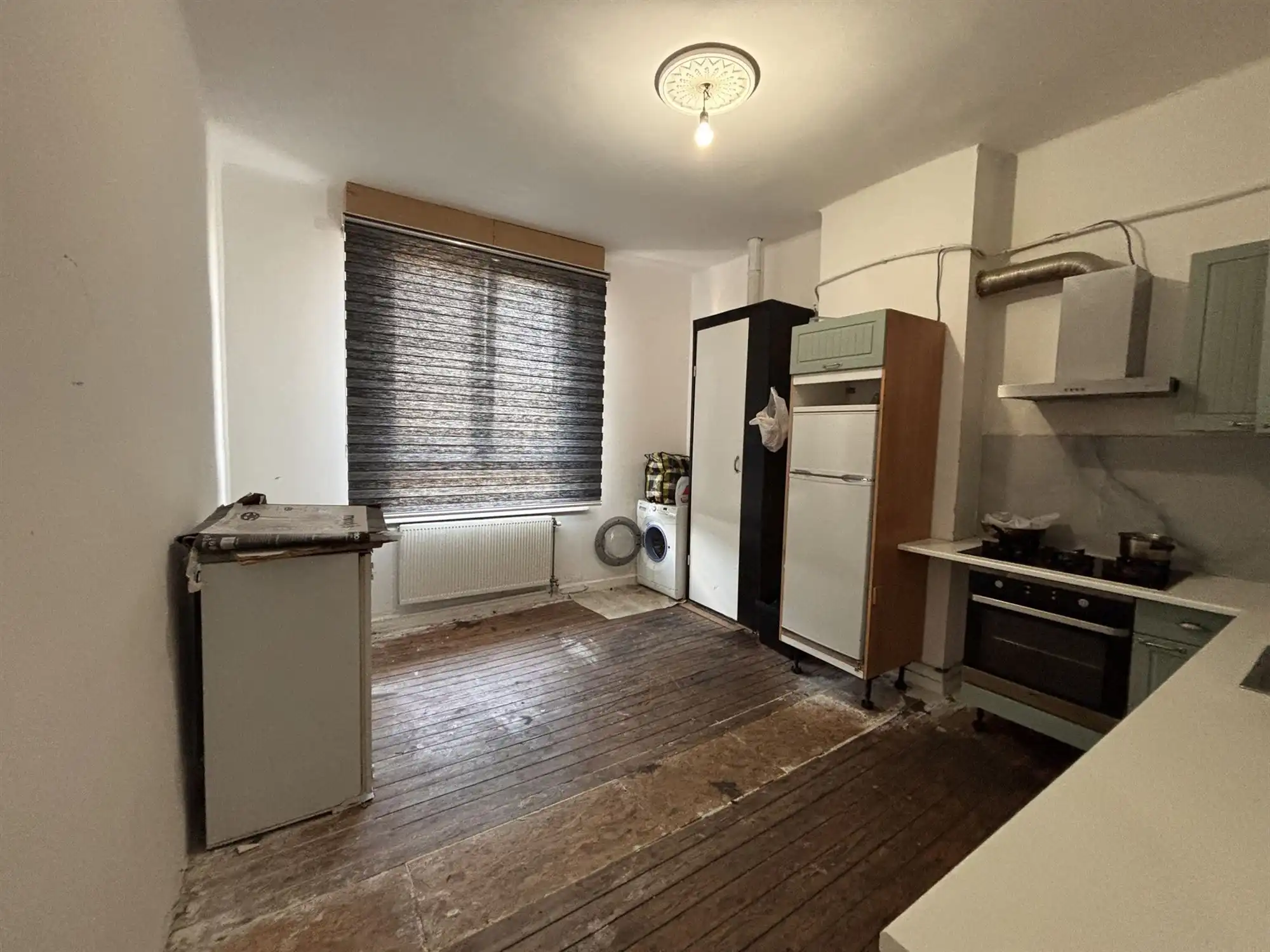 Opbrengsteigendom handelszaak + 3 appartementen foto 18