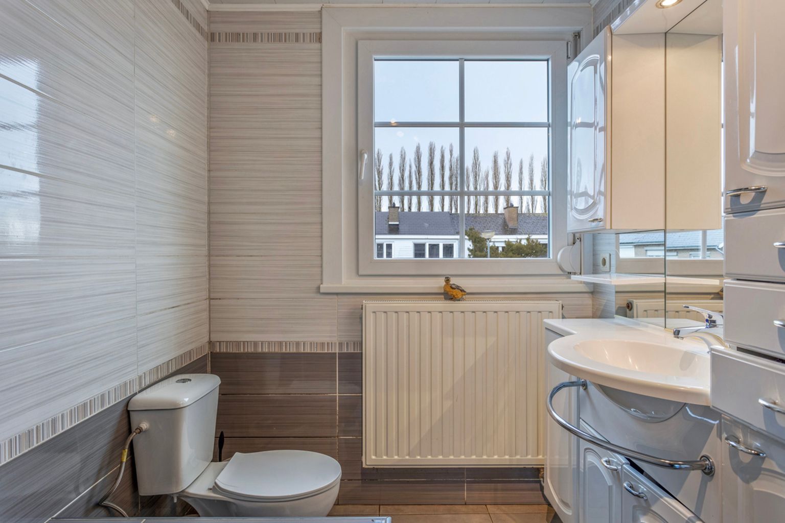 immo DAVID stelt voor: 3-gevel woning foto 14