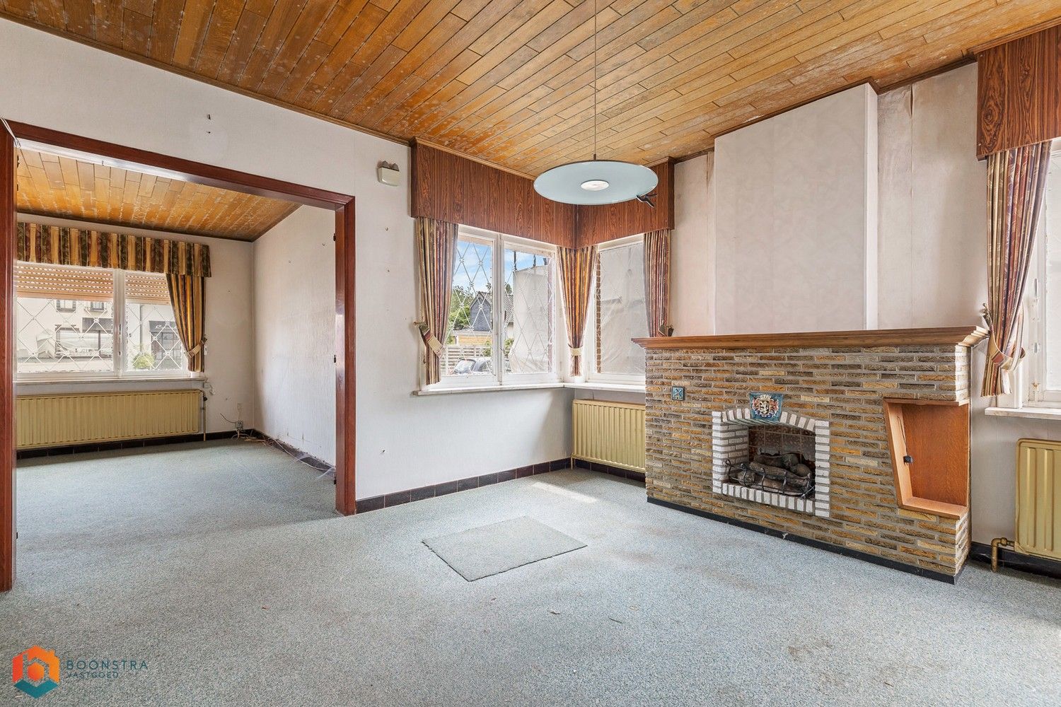 Te renoveren woning met tuin en 2 slpkrs op een perceel van 664 m² foto 3