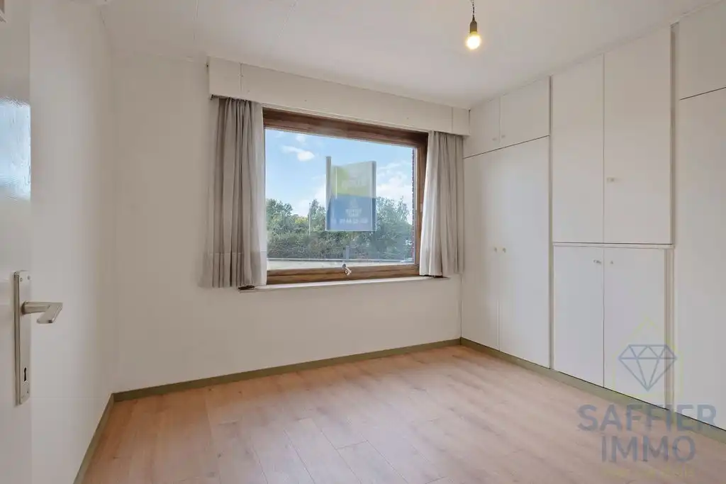 Gerenoveerde woning met zonnepanelen in Harelbeke foto 13