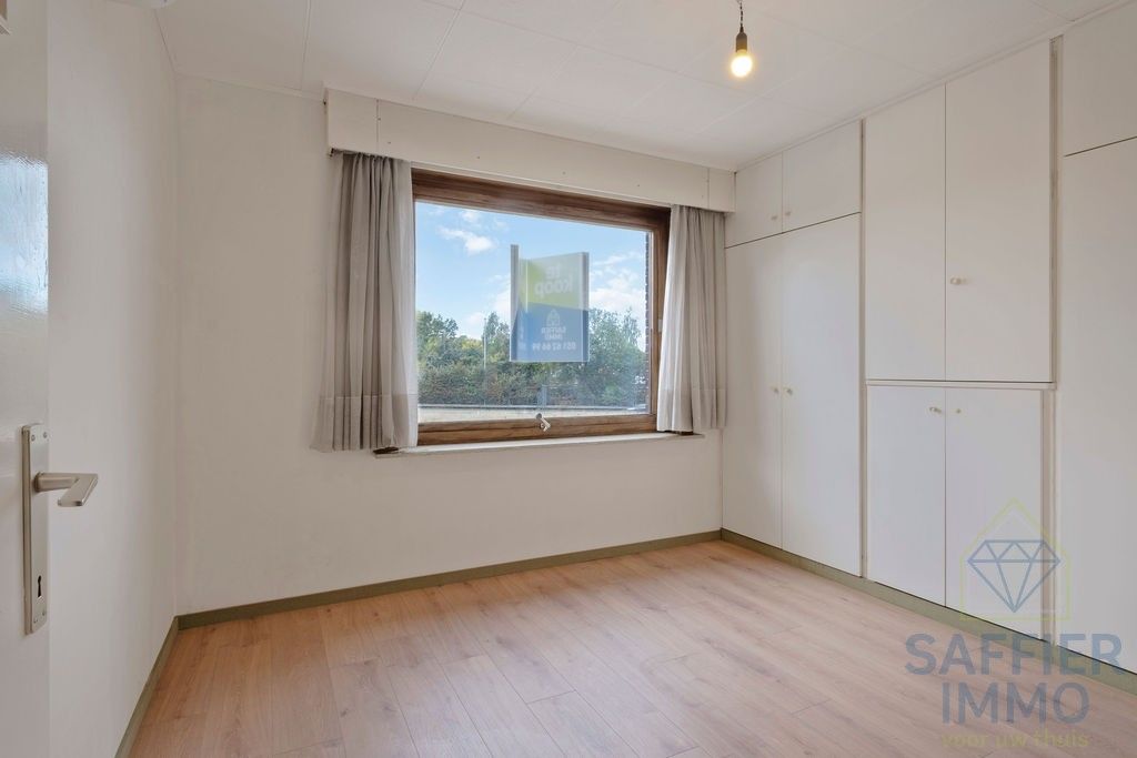 Gerenoveerde woning met extra magazijn in Harelbeke foto 12