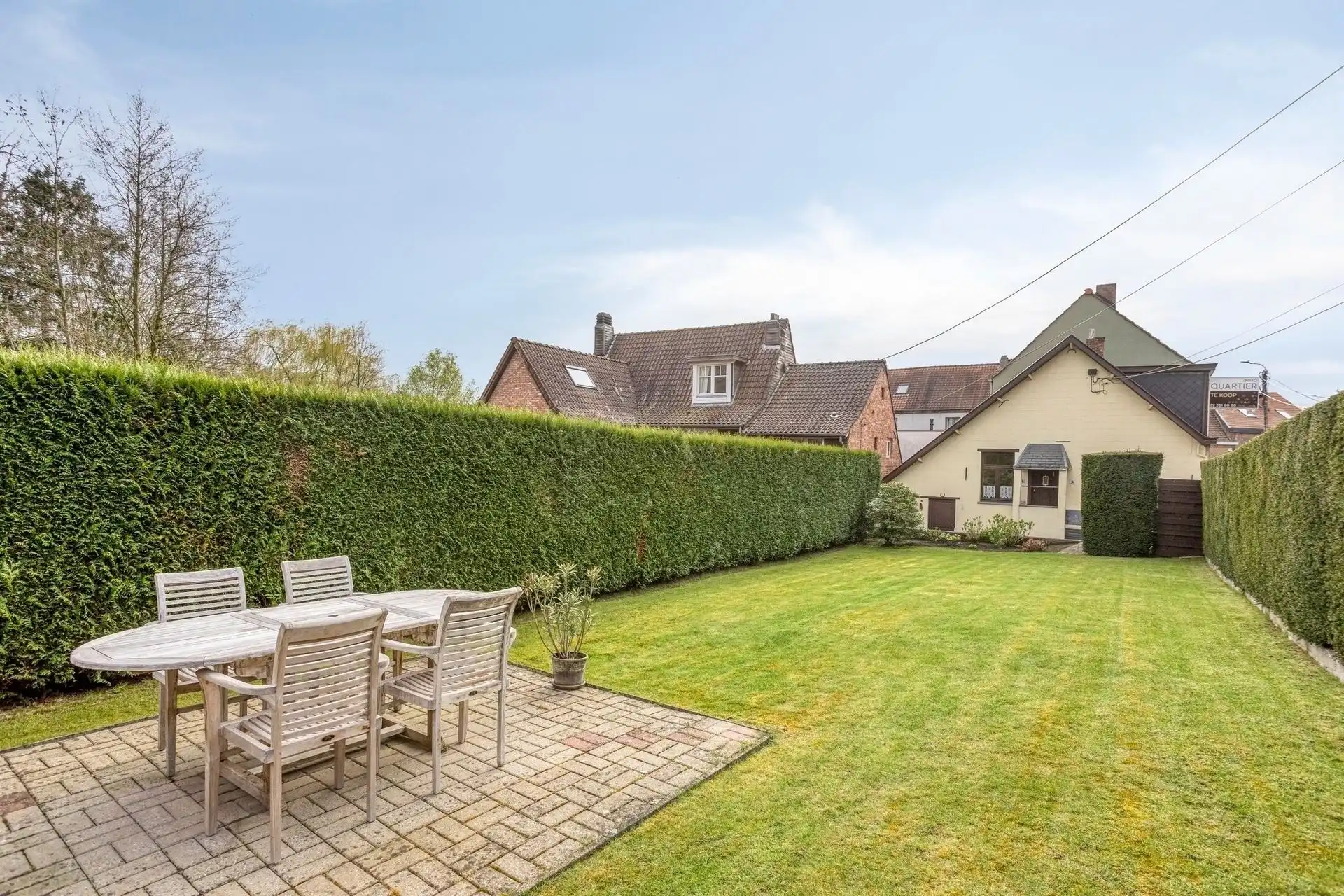 Charmante 3-gevelwoning (1 slpk) met tuin & garage foto 2