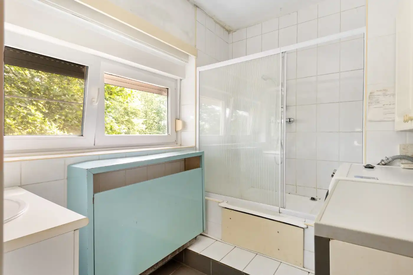 Te renoveren woning met 3 slpk., garage en tuin foto 16