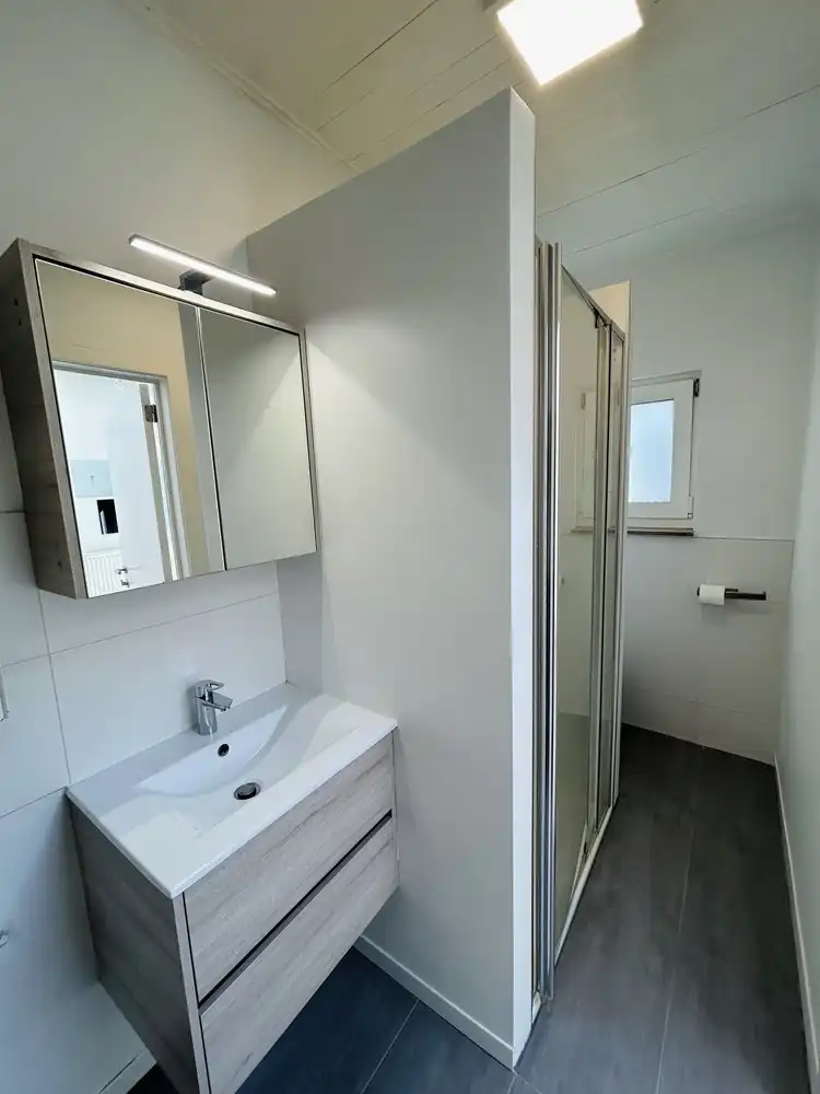 Knusse, instapklare gezinswoning met tuin foto 6