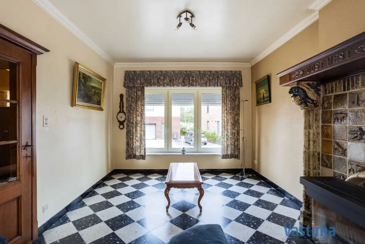 Woning met opslagruimte en grond op strategische ligging foto 6