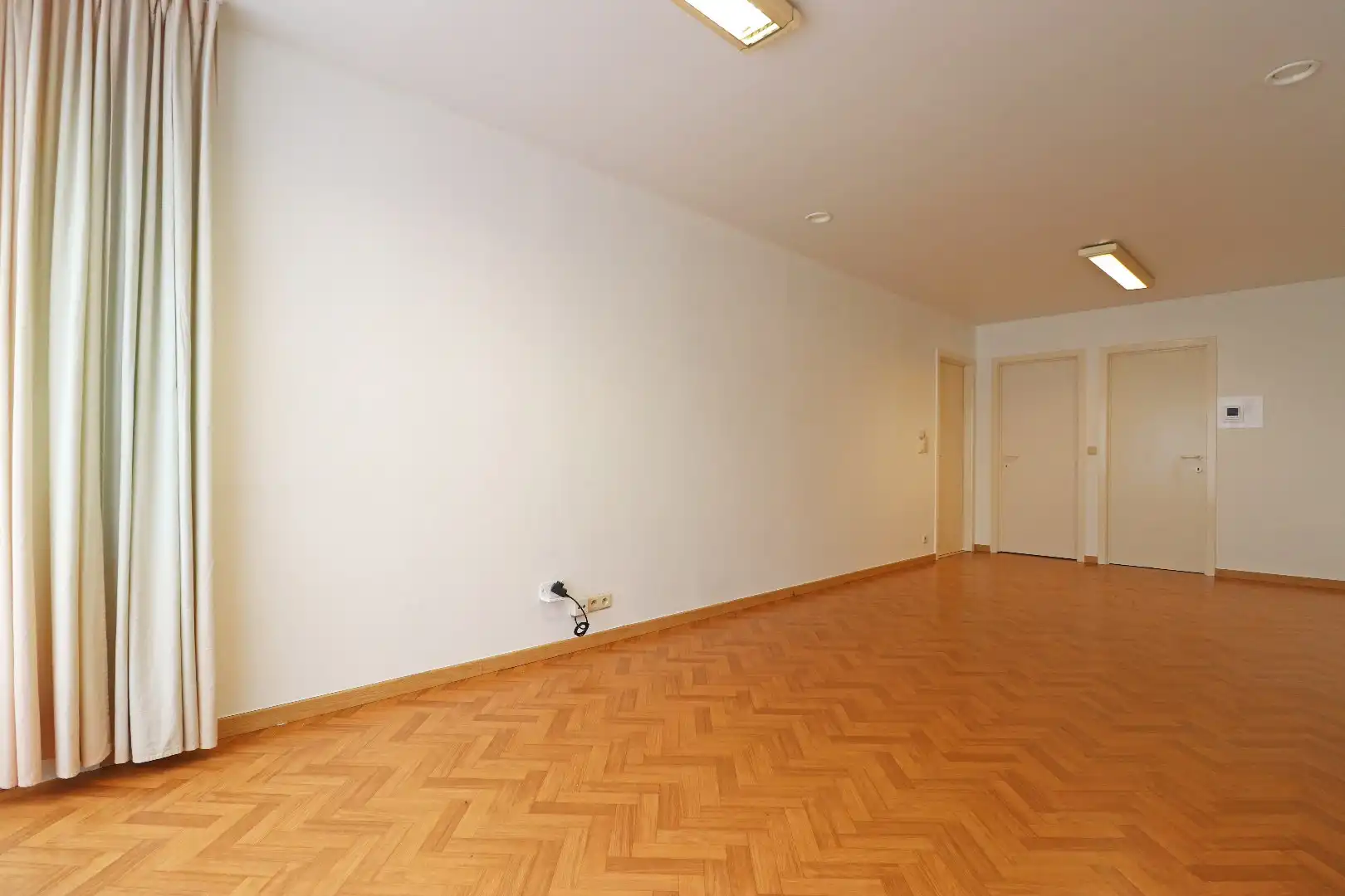 Hoofdfoto van de publicatie: Gelijkvloers appartement met carport