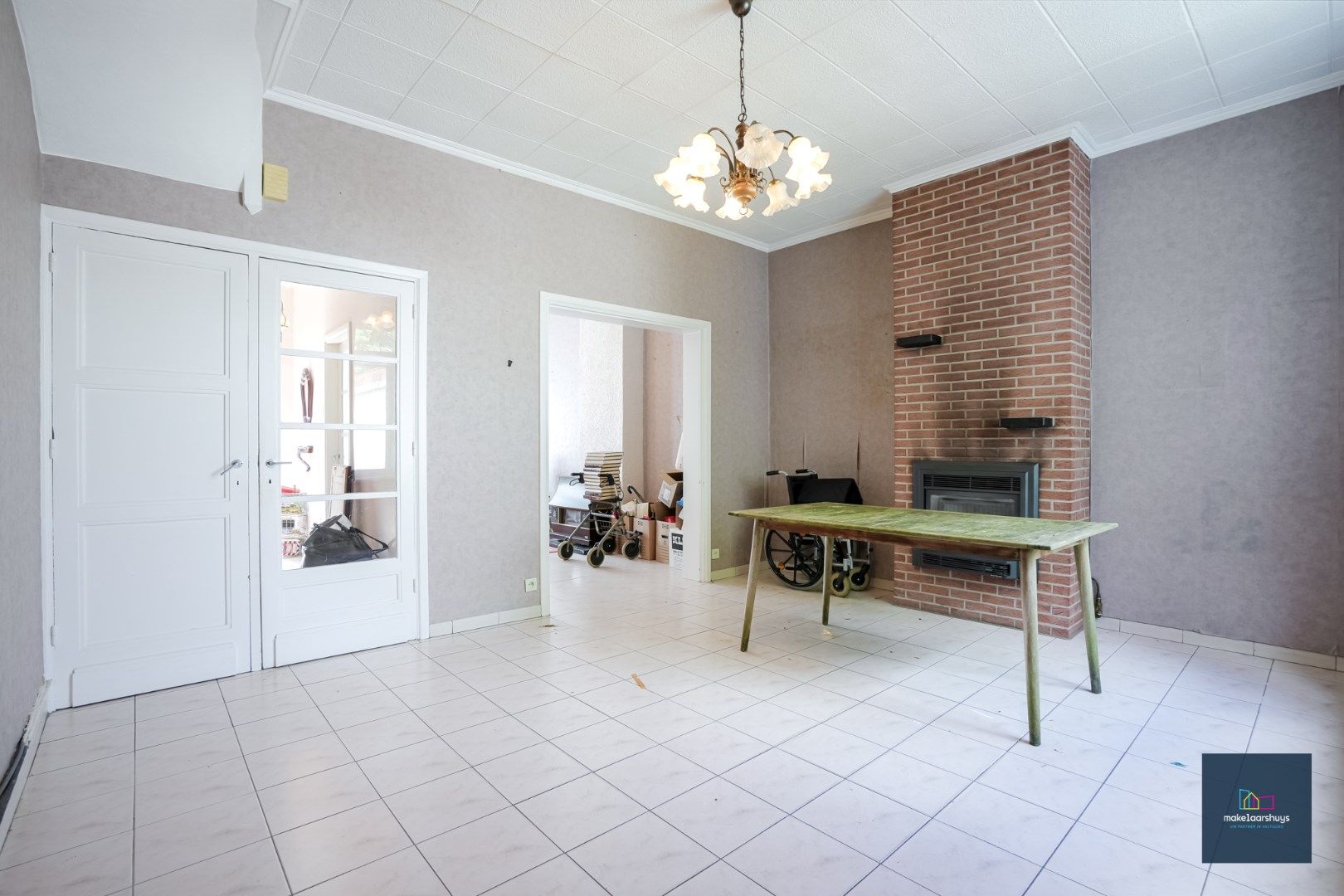 Centraal gelegen te renoveren woning in rij met tuin te Mariakerke foto 5